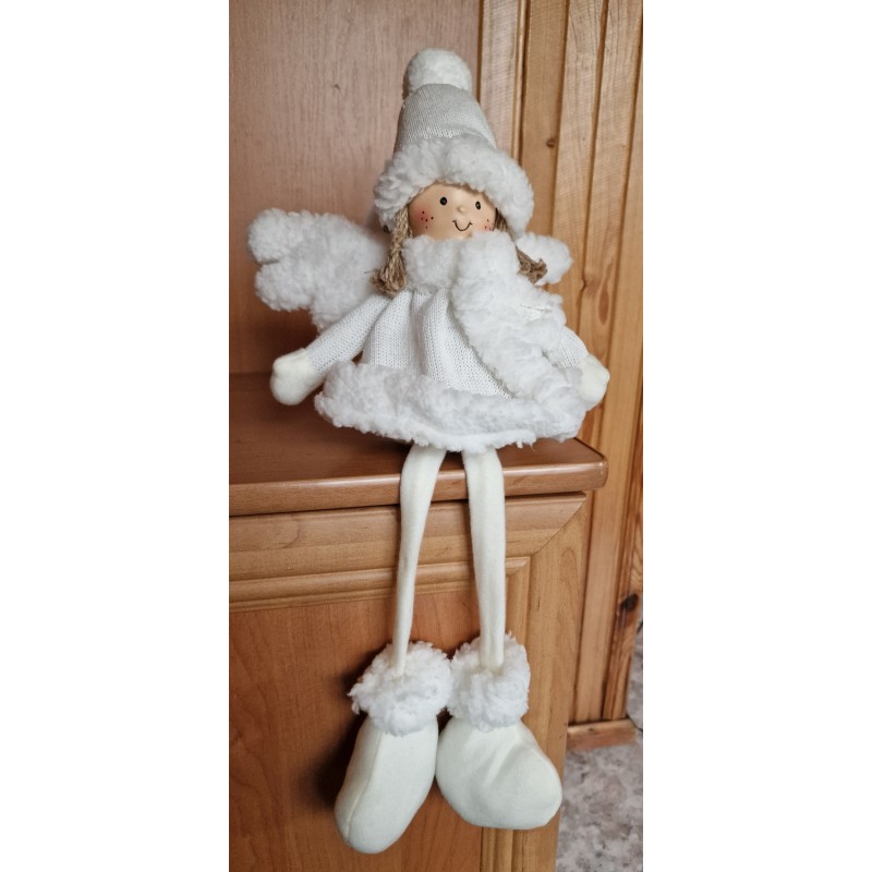 Dziewczynka biały aniołek opuszczone nogi